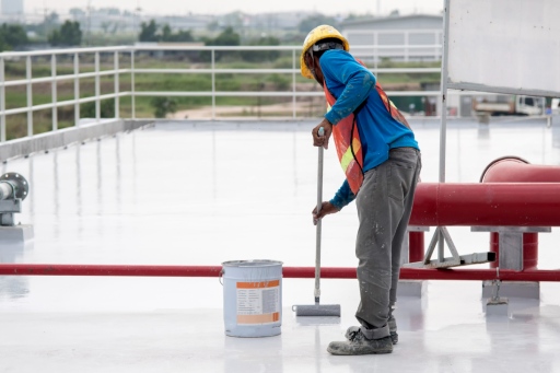 construction worker coating epoxy paint roof slab water proof protection